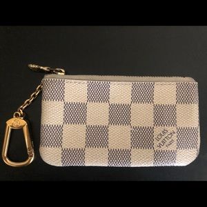 Damier Azur Louis Vuitton key pouch.